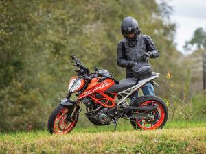 Photo of tail bag on bike - guy standing behind bike