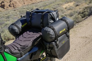 KLR fully loaded with waterproof luggage in black